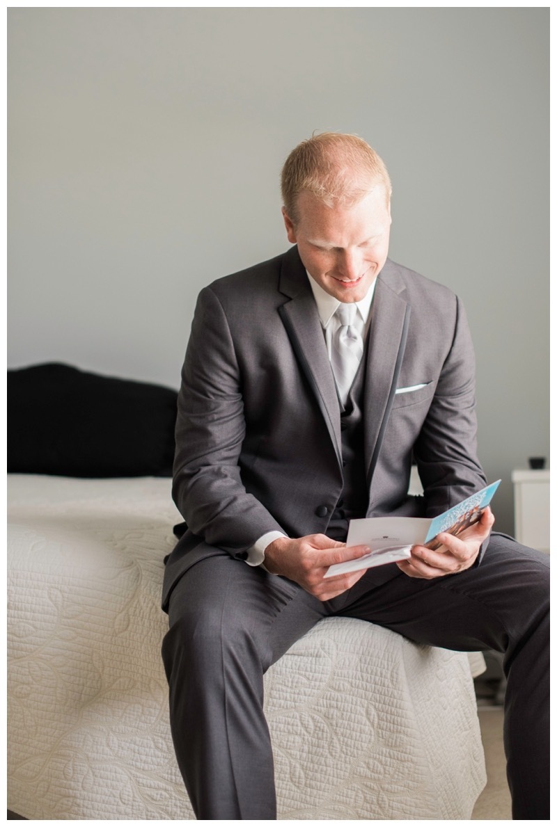 Groom reads a letter written for him by his bride to be.